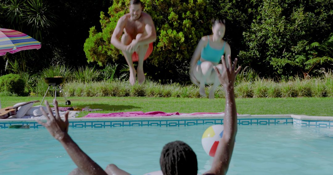 Friends Jumping Into Pool for Summer Fun and Relaxation