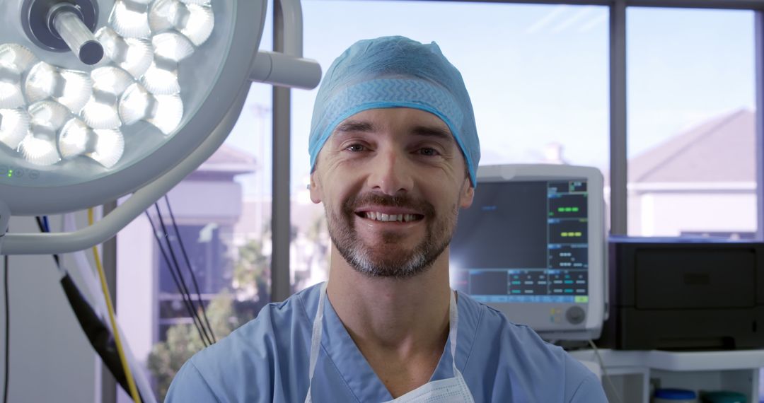 Happy Male Surgeon in Operating Room - Free Images, Stock Photos and Pictures on Pikwizard.com