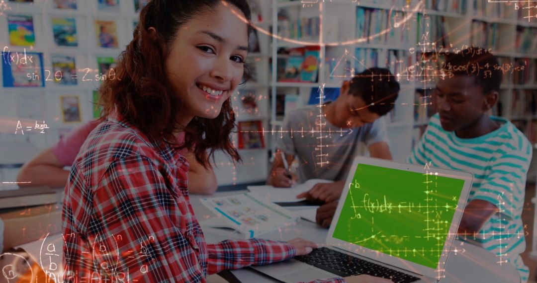 Student Engaging in Collaborative Learning with Laptop and Math Equations