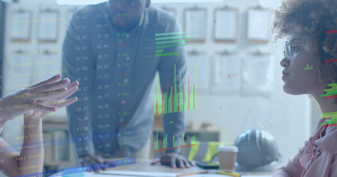 Diverse Team Discussing Data in Modern Office