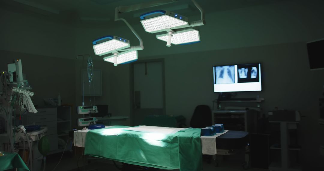 Empty Operating Room with Surgical Lights and Monitors - Free Images, Stock Photos and Pictures on Pikwizard.com