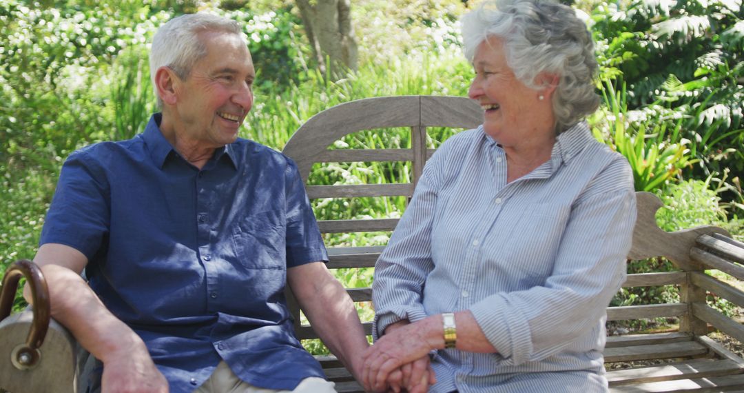 Joyful Senior Couple Enjoying Retired Life Together in Sunny Garden