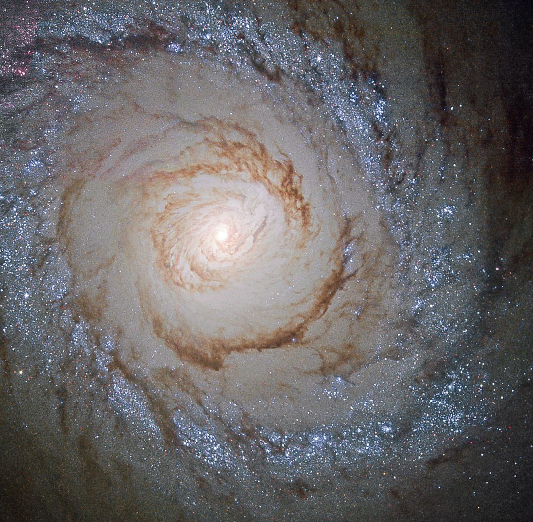 A Hubble View of Starburst Galaxy Messier 94 - Free Images, Stock Photos and Pictures on Pikwizard.com