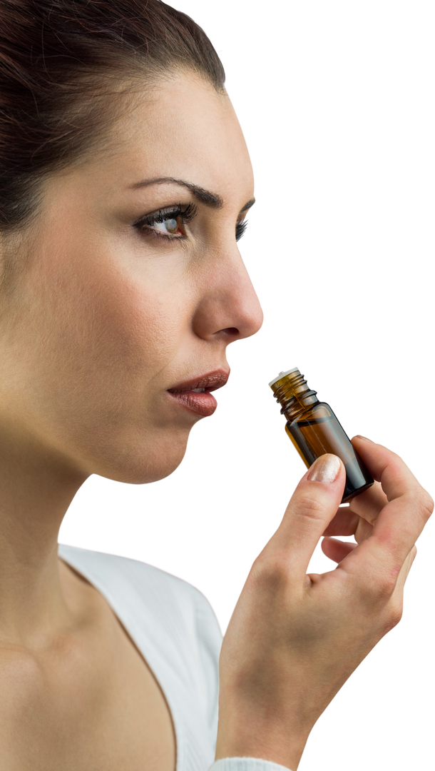 Side Profile of Woman Holding Transparent Medicine Bottle for Healing - Download Free Stock Images Pikwizard.com