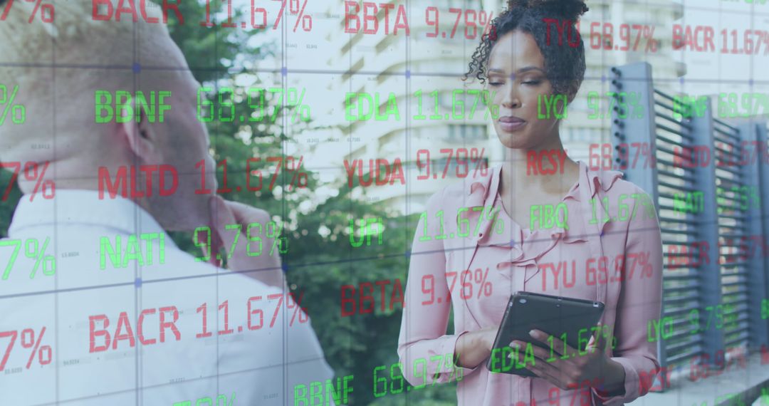 Diverse Professionals Discussing Stock Market Data Visualization