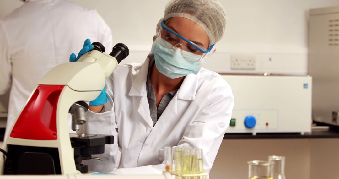 Scientist Conducting Microscope Analysis in Laboratory - Free Images, Stock Photos and Pictures on Pikwizard.com