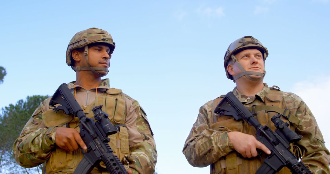 Military Soldiers Engaging in Rifle Training Outdoors