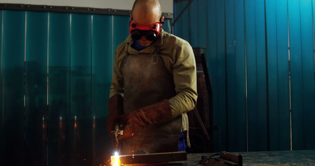 Metalworker Cutting Steel with Torch in Workshop - Free Images, Stock Photos and Pictures on Pikwizard.com