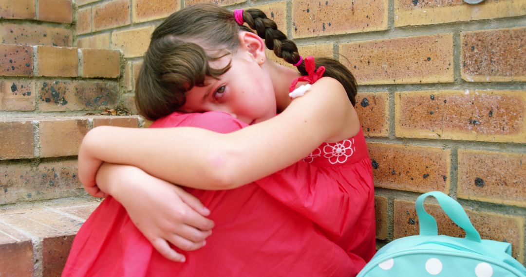 Lonely Schoolgirl Sitting Alone on School Stairs