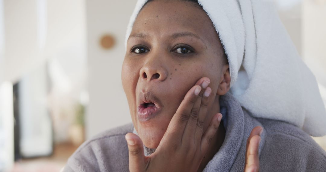 Woman Examining Skin Condition in Mirror After Shower - Free Images, Stock Photos and Pictures on Pikwizard.com