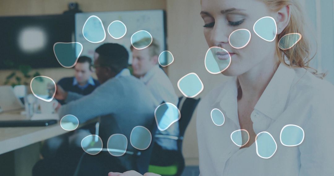 Calm Executive Amidst Collaborative Team in Office Environment