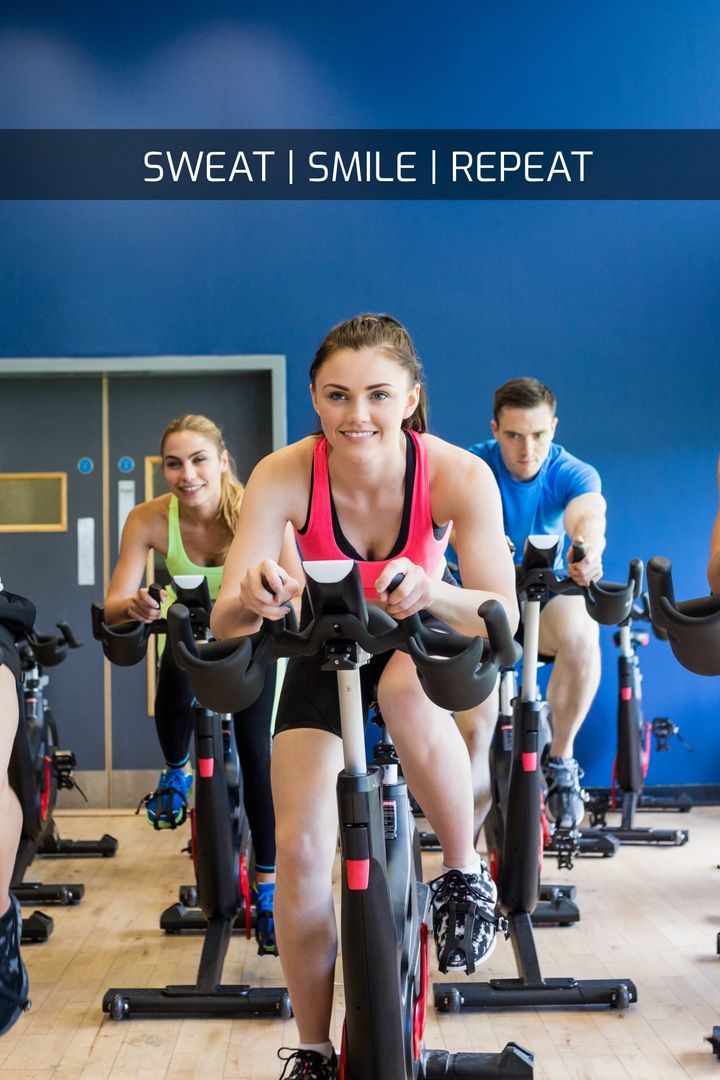 Energetic Group Spin Class Embracing Fitness and Joy