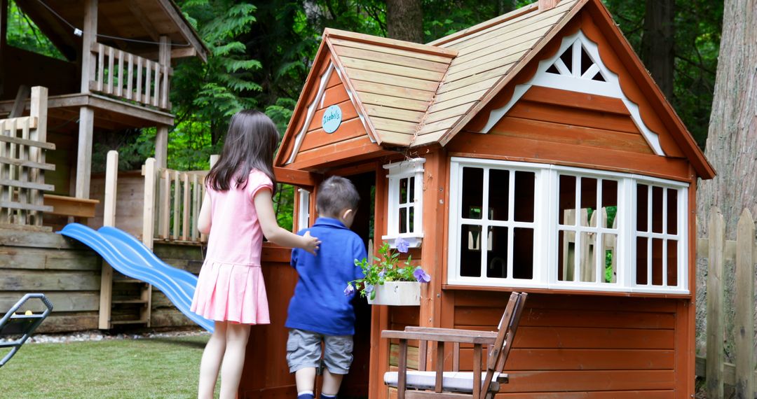 Children Playing in Wooden Playhouse Outdoor on Summer Day - Free Images, Stock Photos and Pictures on Pikwizard.com