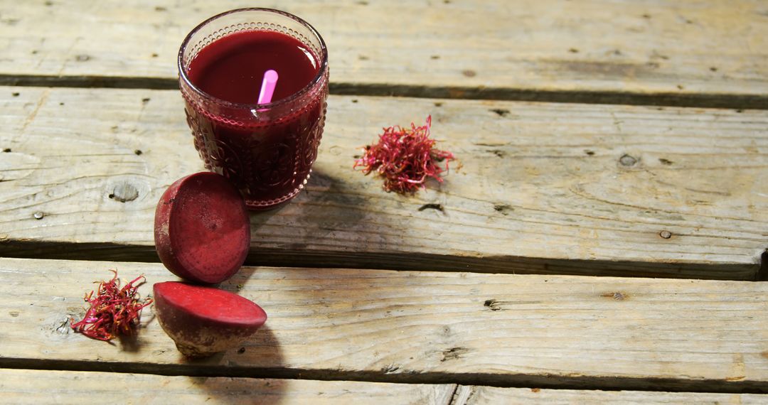 Rustic Beetroot Juice on Wooden Table with Natural Textures - Free Images, Stock Photos and Pictures on Pikwizard.com