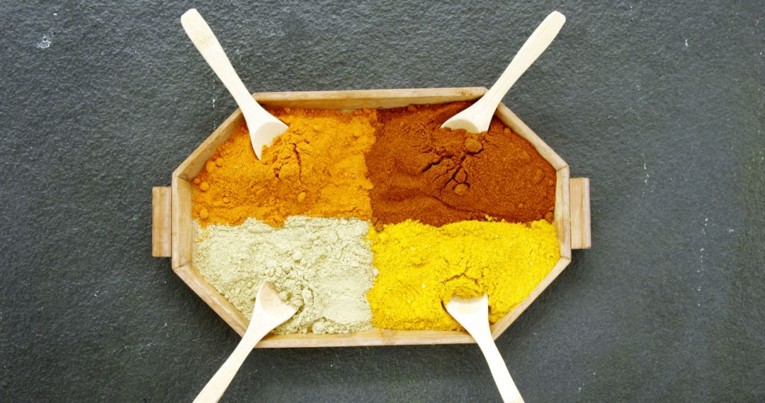 Assortment of Colorful Spices in Wooden Tray with Spoons - Free Images, Stock Photos and Pictures on Pikwizard.com