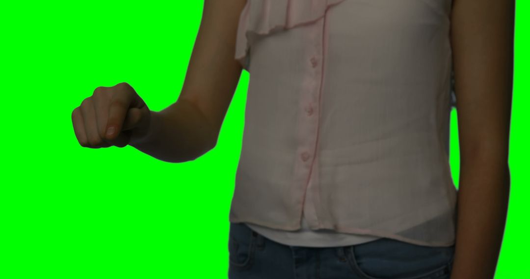 Woman Pointing Gesture on Green Screen Background for Chroma Key - Free Images, Stock Photos and Pictures on Pikwizard.com