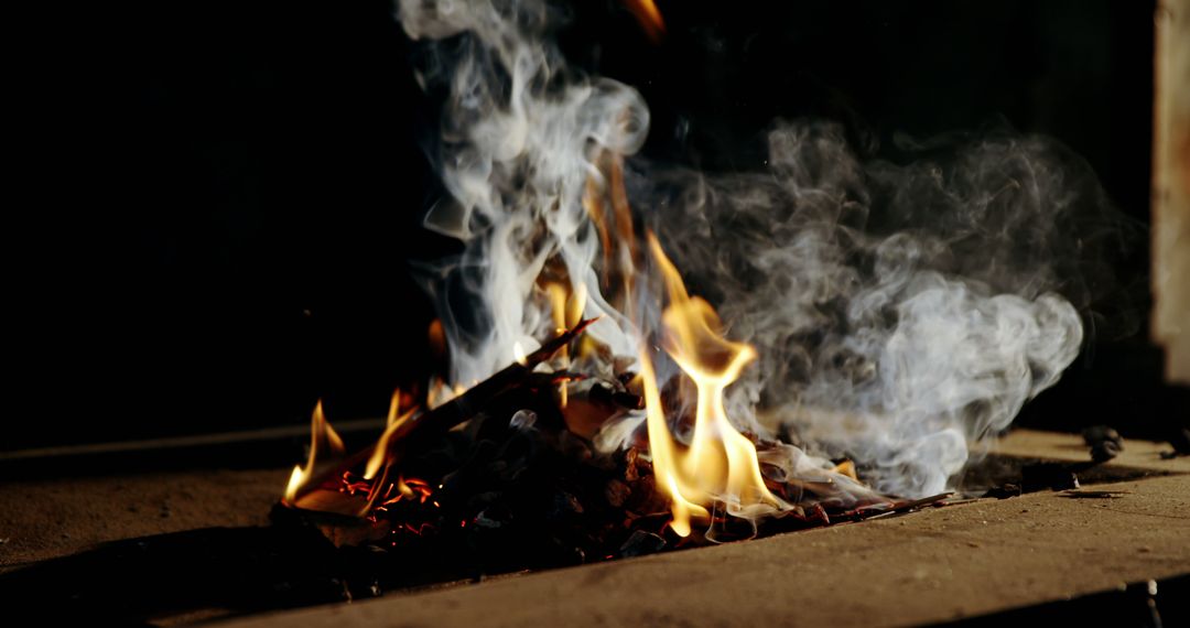 Close-up of Bonfire with Yellow Flames and White Smoke - Free Images, Stock Photos and Pictures on Pikwizard.com