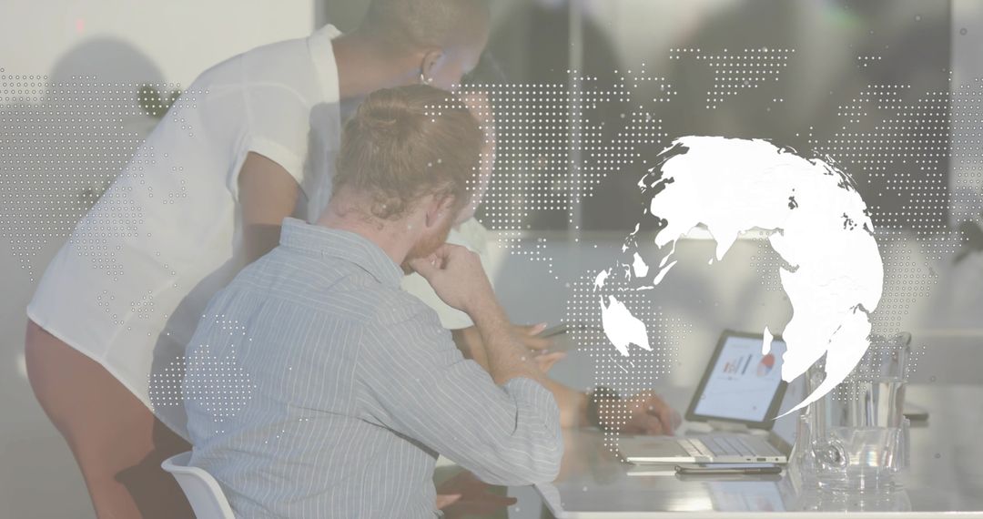 Collaborating Team Analyzing Global Data on Laptop with Dotted World Map and Glass Table