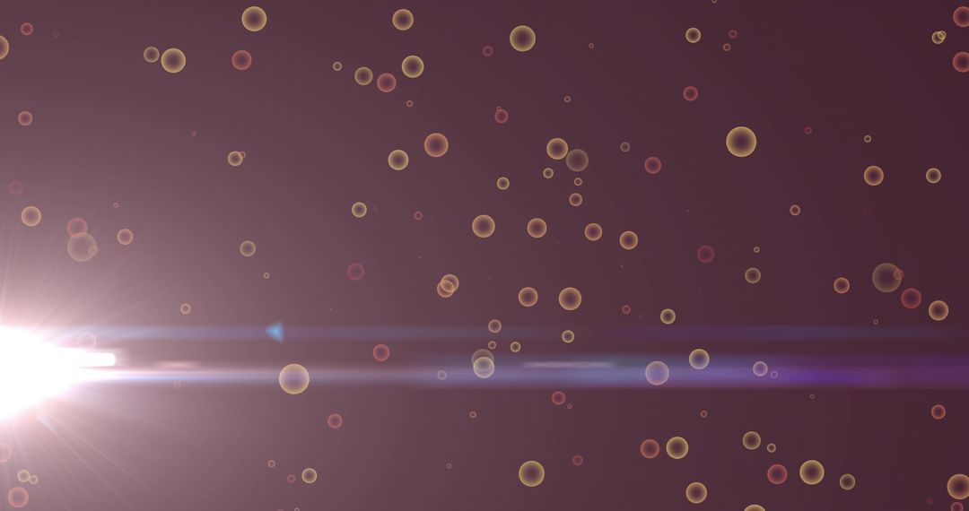 Bokeh Lights with Lens Flare Creating Energetic Abstract Background