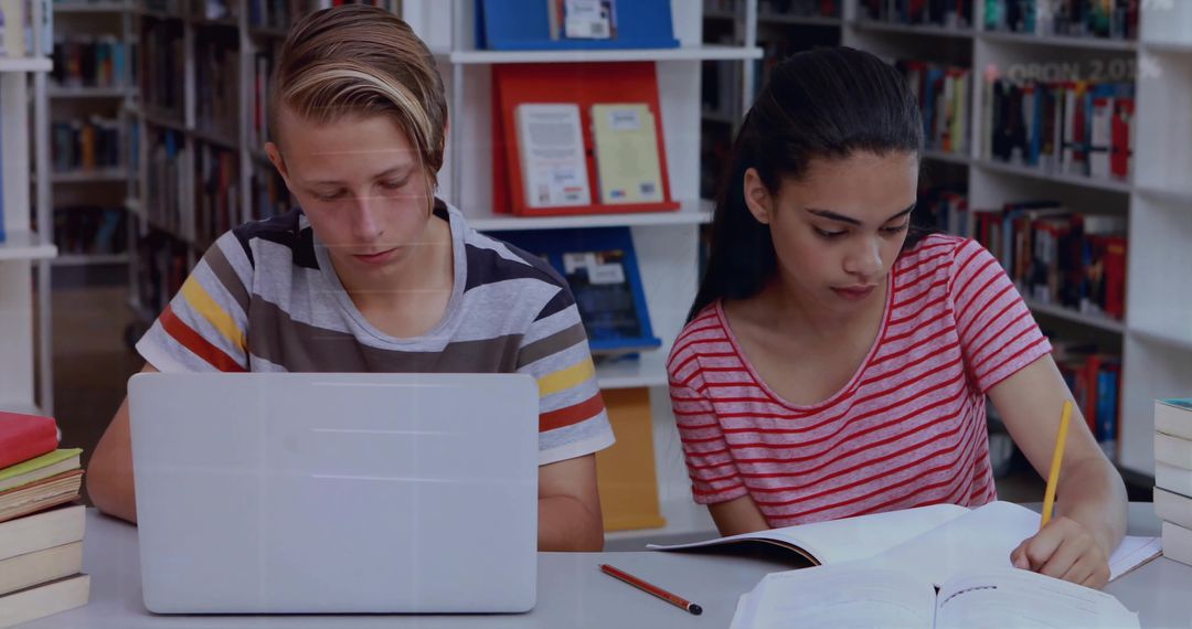 Diverse Students Studying Together in Modern Library