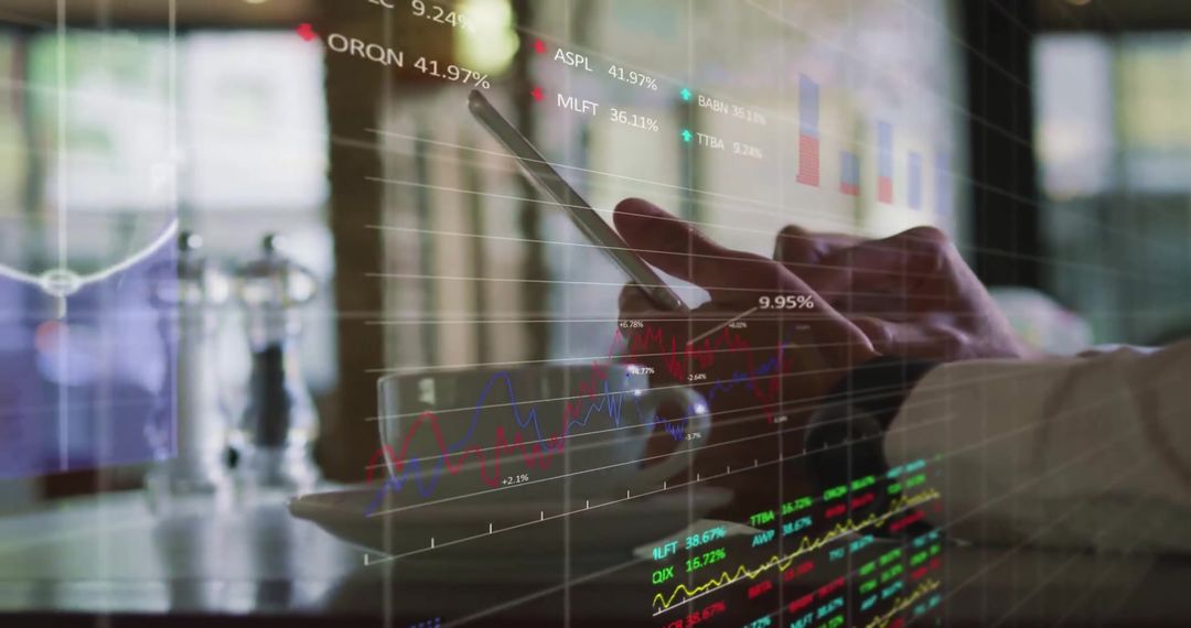 Man Analyzing Financial Data on Tablet with Graphs and Charts