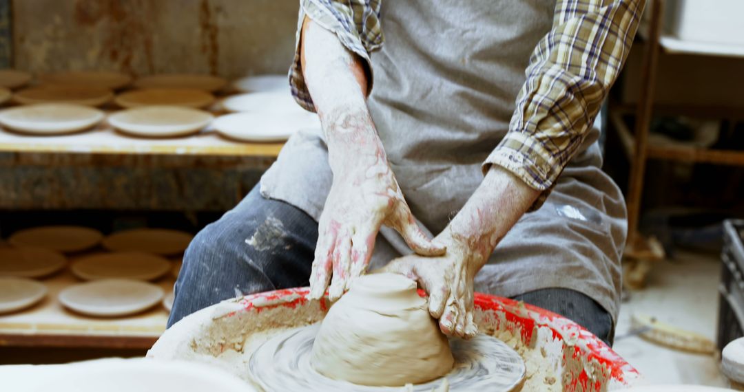 Artisan Shaping Clay on Pottery Wheel - Free Images, Stock Photos and Pictures on Pikwizard.com