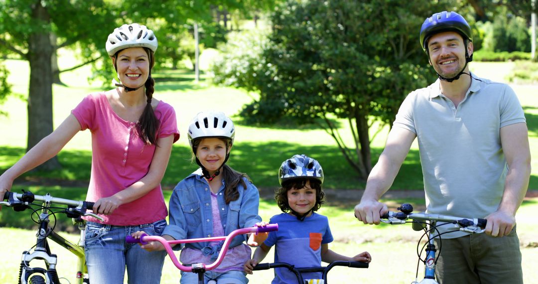 Happy Family Enjoying Outdoor Cycling in Park - Free Images, Stock Photos and Pictures on Pikwizard.com