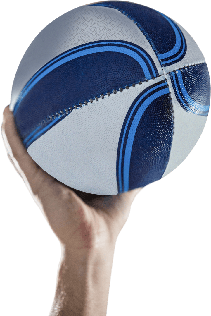 Close-Up of Hand Holding Transparent Rugby Ball