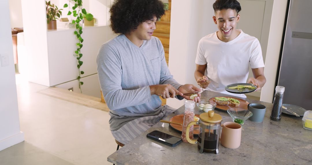 Diverse Friends Enjoying Avocado Toast and Coffee in Modern Kitchen