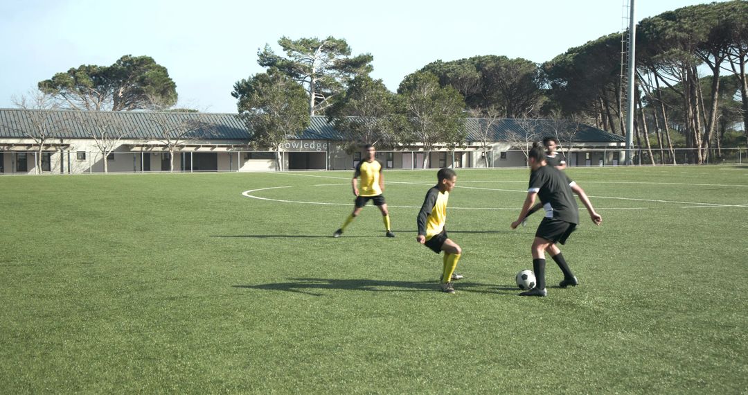 Intense Soccer Match with Focus on Player and Ball Action