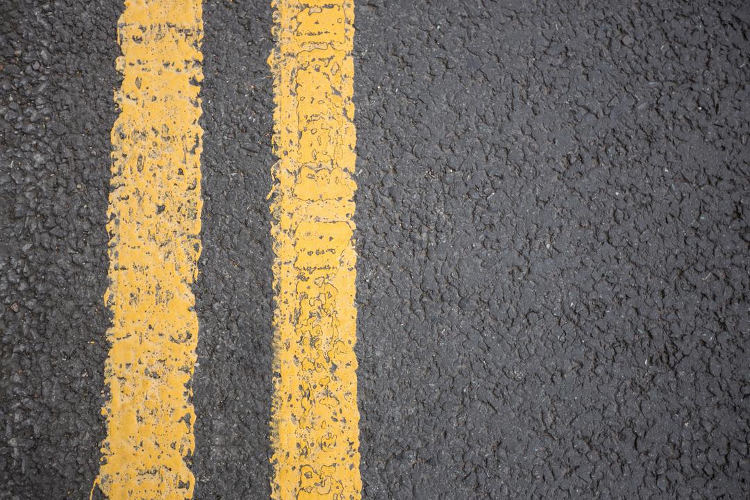 Close-up of Yellow Road Markings on Asphalt - Free Images, Stock Photos and Pictures on Pikwizard.com