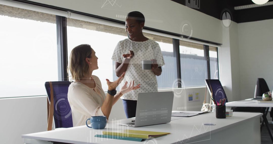 Diverse Colleagues Analyzing Financial Data at Work
