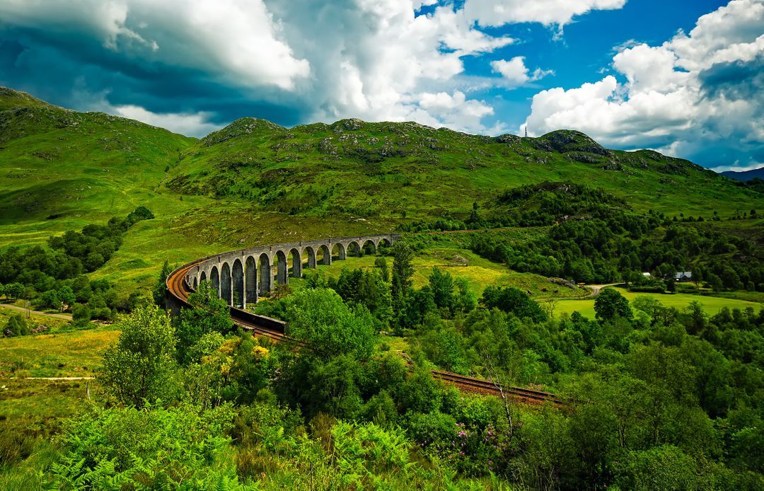 Scenic View of Historic Railway Viaduct in Lush Green Mountains - Free Images, Stock Photos and Pictures on Pikwizard.com