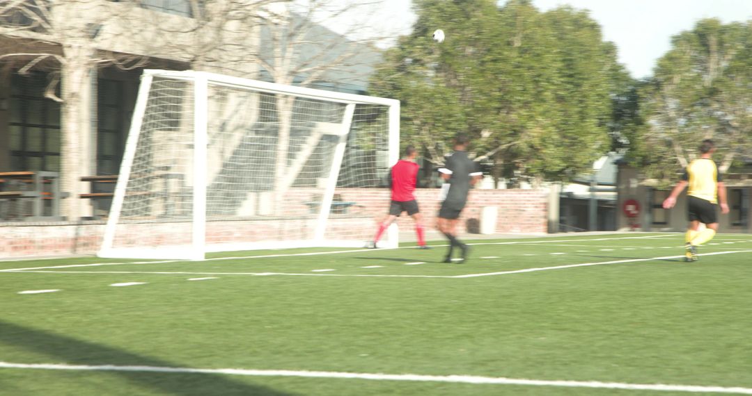 Soccer Players Practicing on Field, Showcasing Teamwork and Strategy