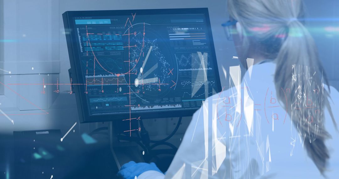 Scientist Analyzing Data on Futuristic Computer - Free Images, Stock Photos and Pictures on Pikwizard.com