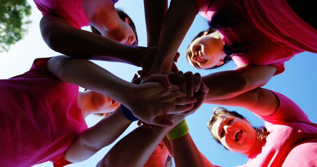 Team of Women Huddling Together for Motivation - Free Images, Stock Photos and Pictures on Pikwizard.com