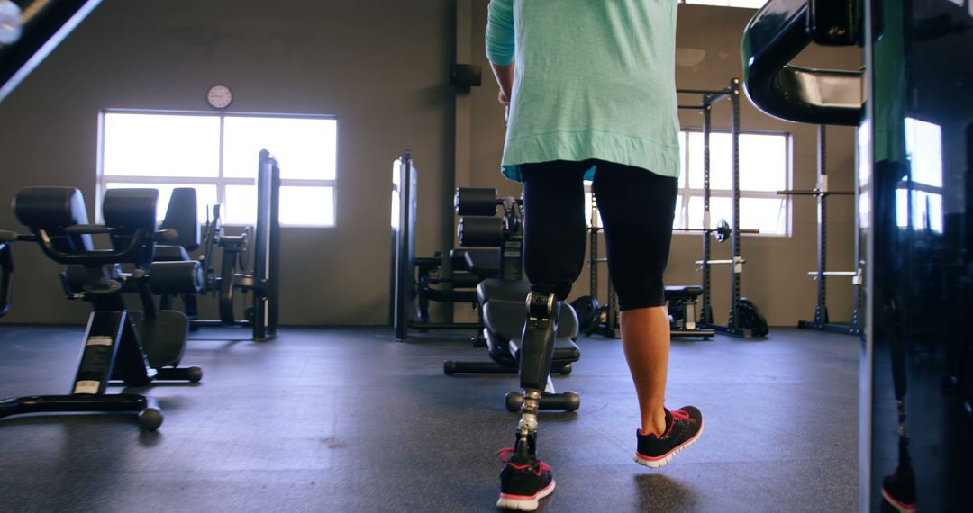 Athlete with Prosthetic Leg Exercising in Gym - Free Images, Stock Photos and Pictures on Pikwizard.com