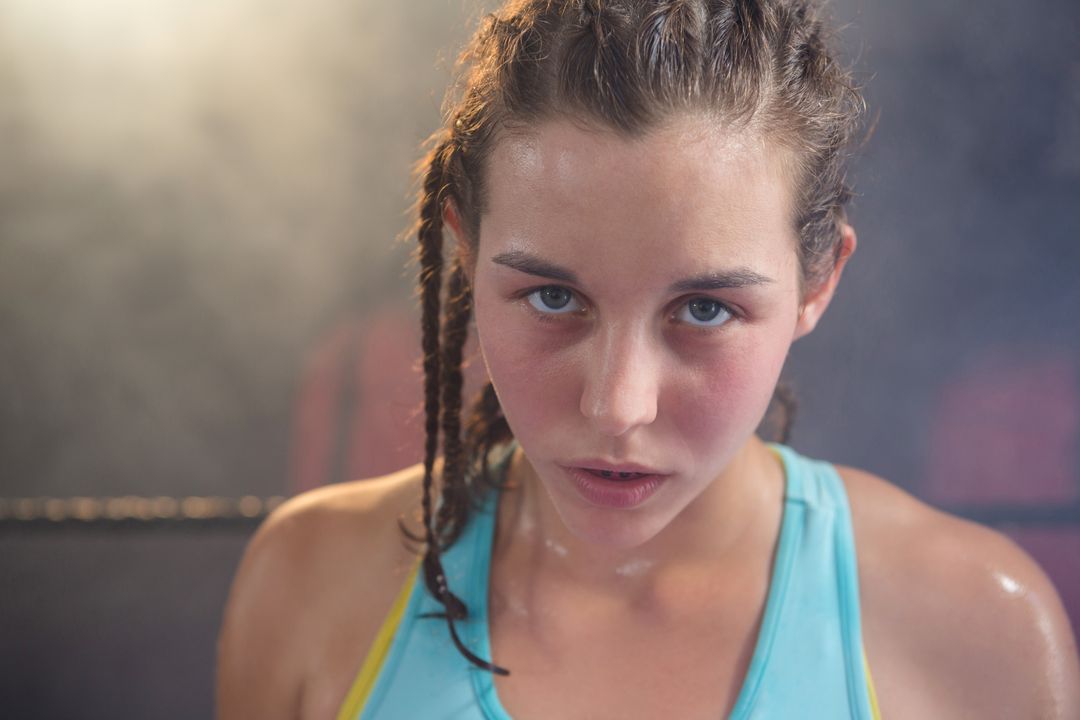 Determined Young Female Boxer in Fitness Studio - Free Images, Stock Photos and Pictures on Pikwizard.com