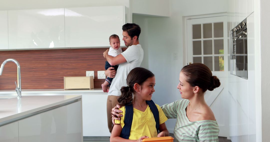 Happy Family in Bright Modern Kitchen, Parents with Two Children - Free Images, Stock Photos and Pictures on Pikwizard.com