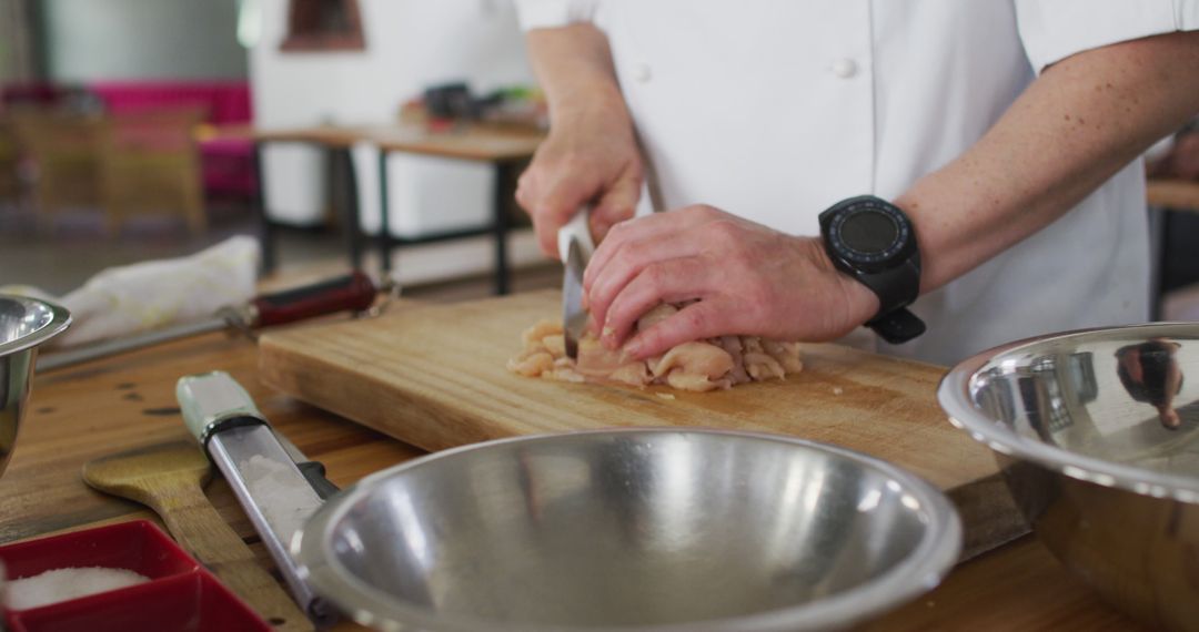 Close-up of Chef Chopping Meat on Wooden Board - Free Images, Stock Photos and Pictures on Pikwizard.com