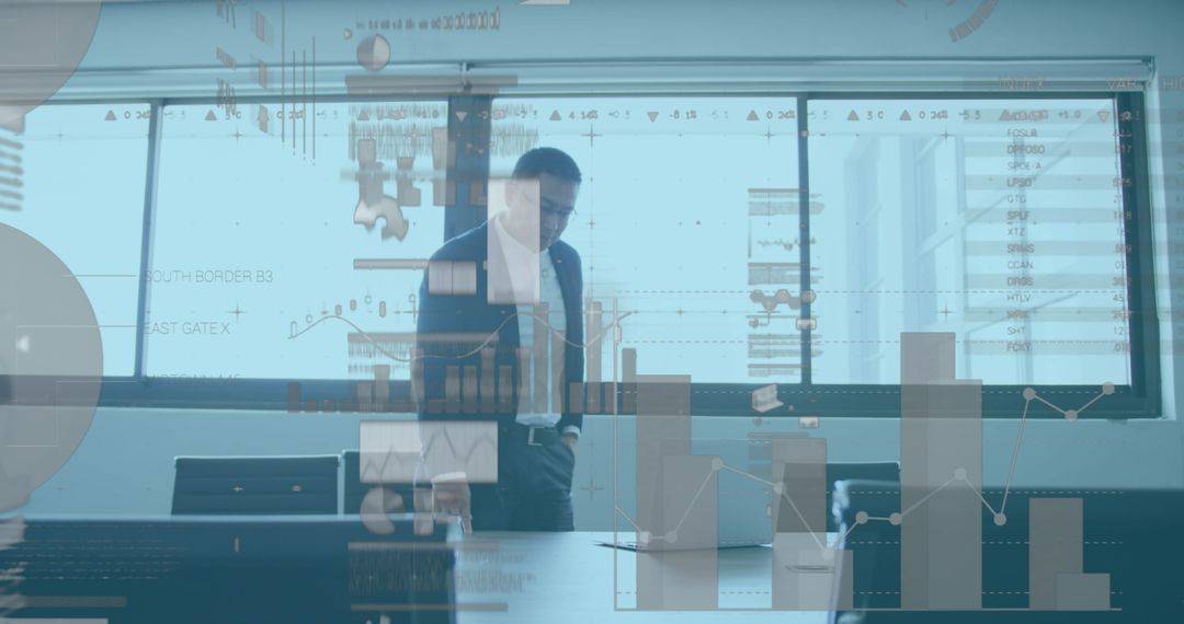 Businessman Analyzing Data with Holographic Charts