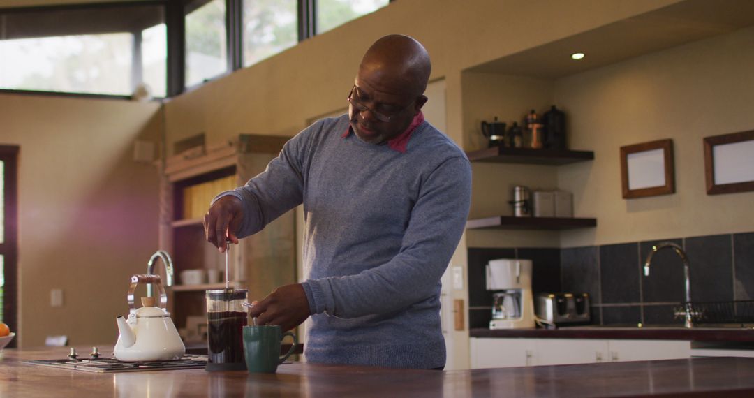 Man Brewing Fresh Coffee in Modern Kitchen - Free Images, Stock Photos and Pictures on Pikwizard.com