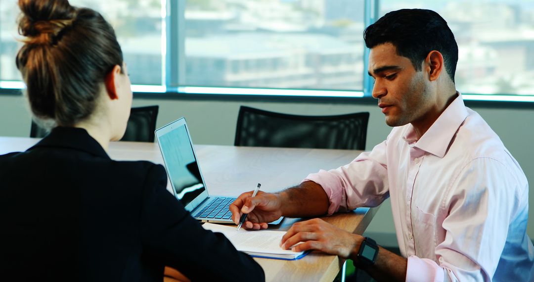 Professional Team Collaboration in a Modern Office Setting