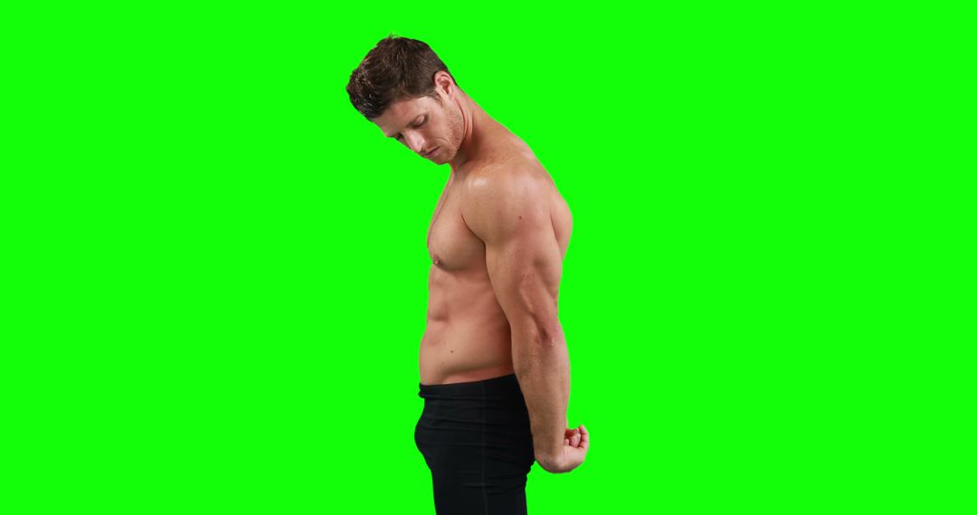 Fit Shirtless Man Flexing Muscles Against Green Screen - Free Images, Stock Photos and Pictures on Pikwizard.com
