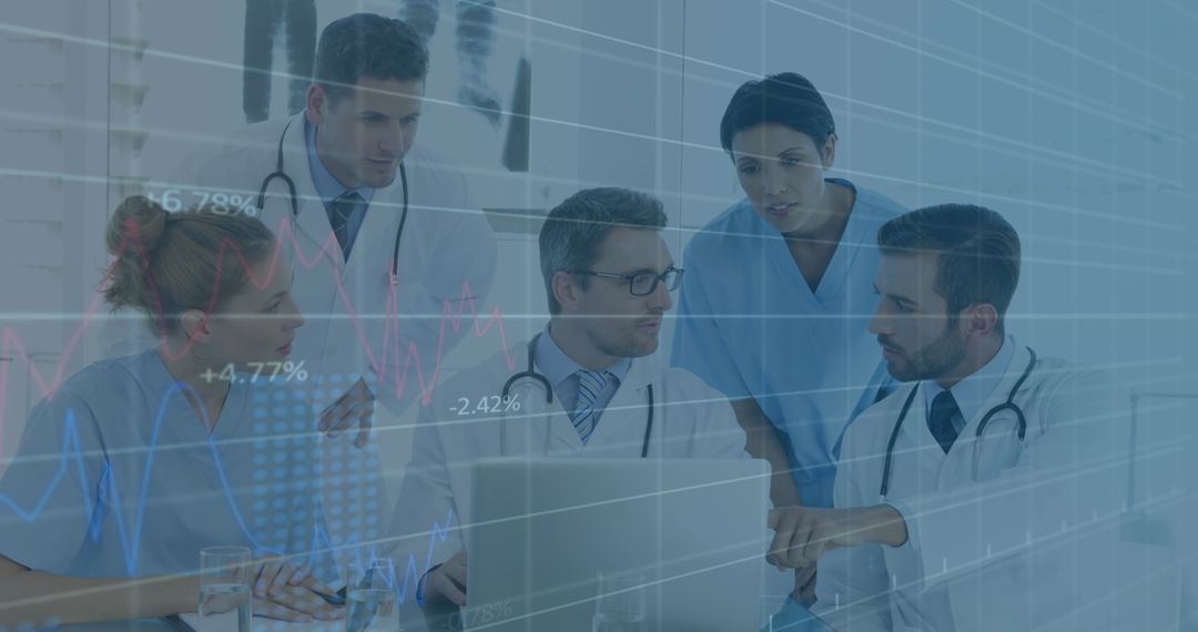 Medical Team Analyzing Financial Data on Laptop Interface