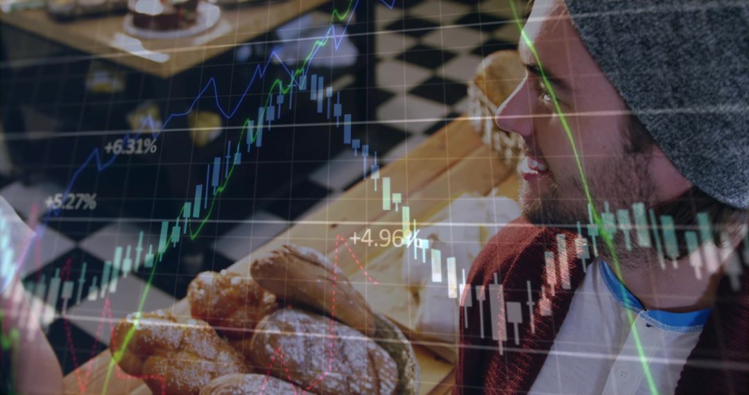 Man Enjoying Coffee at Cafe Overlayed with Stock Market Graphs