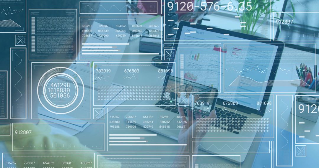 Open laptop displaying HUD dashboards and charts with team collaborating in modern workspace