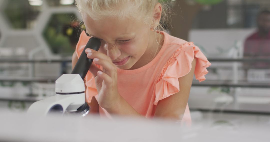 Image of happy caucasian girl with microscope during lesson - Free Images, Stock Photos and Pictures on Pikwizard.com