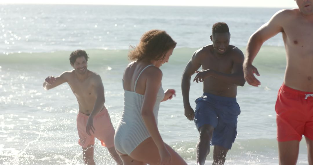 Diverse Friends Enjoying Lively Day at Beach in Slow Motion