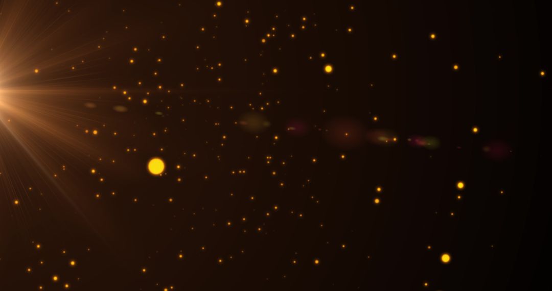 Glowing Yellow Lights on Black Background in Abstract Motion